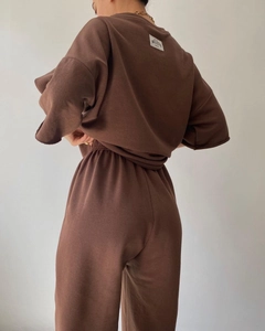 Rear view detail of brown casual lounge set with dropped shoulder sweatshirt and jogger pants