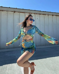 Detail view of the abstract print two-piece mesh set with long sleeves and tie-up design