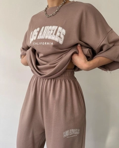 Detail of mauve lounge set featuring Los Angeles California white letter printing