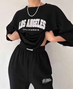 Detail of Los Angeles California letter print on black long sleeve casual sweatshirt