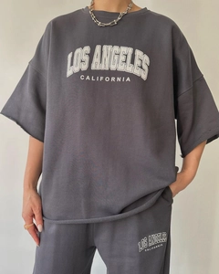 Detail of loose-fit charcoal grey cotton set with Los Angeles California letter print