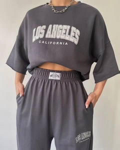 Detail of Los Angeles print on charcoal grey short sleeve sweatshirt and joggers set
