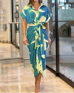 Detailed view of the blue floral shirt dress showing lapel collar and waist tie belt