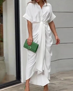 Close-up of elegant white shirt dress with waist twist knot and short sleeves detail