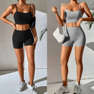 Women's rib-knit yoga set with spaghetti strap crop top and high-waisted shorts