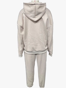 Back view of beige hooded sweatshirt and matching joggers set on a white mannequin