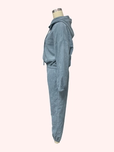 Detail view of blue corduroy hooded sweatshirt and drawstring jogger pants set