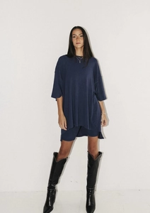 Close-up of oversized navy blue T-shirt and shorts set in premium cotton blend fabric