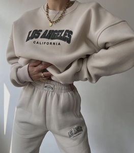 Detail of Los Angeles print on beige thick fleece sweatshirt and matching joggers set