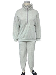 Close-up of light gray thick cotton blend two-piece lounge set with half-zip sweatshirt