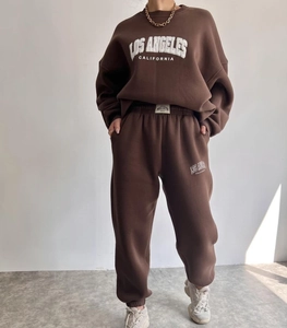 Detail of Los Angeles print on chocolate brown fleece sweatshirt and joggers set