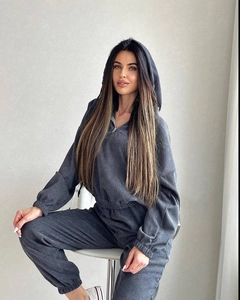 Detail view of charcoal grey corduroy fabric on a hooded half-zip tracksuit set