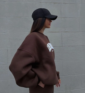 Detail of oversized dark brown Los Angeles California print sweatshirt set