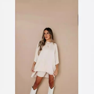 Women's casual cream two-piece lounge set with oversized T-shirt and cycling shorts
