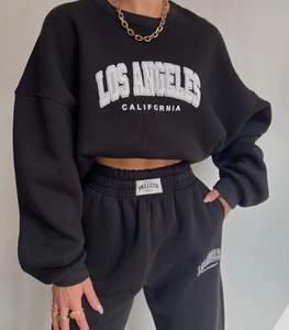 Close-up of Los Angeles print on thick black fleece sweatshirt and matching joggers set