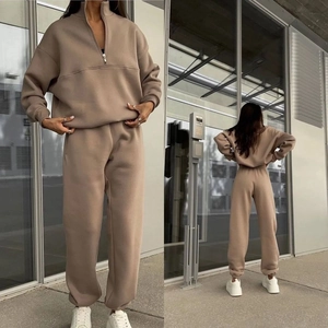 Detail view showing front and back of women's casual fleece sweatshirt and joggers set
