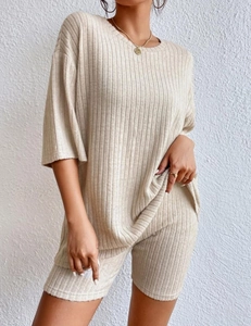 Detail of oatmeal ribbed knit texture on a women's round neck casual two-piece set