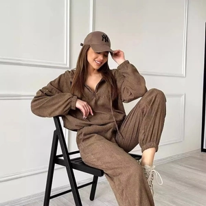 Women's two-piece brown corduroy set featuring a zip-up hoodie and matching joggers