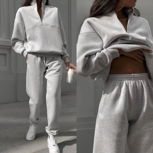Women casual two-piece tracksuit set with half-zip sweatshirt and jogger pants in light grey