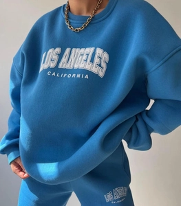 Detail of Los Angeles print on heavy cotton Klein blue oversized sweatshirt set