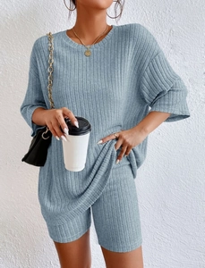 Detailed view of fog blue ribbed knit texture on women's casual t-shirt and shorts set