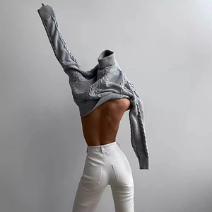 Women's chic grey cable knit turtleneck sweater with long sleeves in a stylish casual fit
