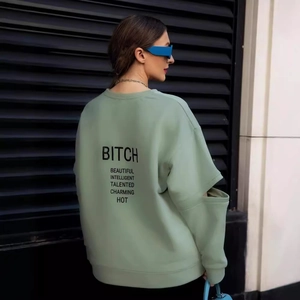 Sweatshirt vert menthe pour femmes avec manches découpées et imprimé au dos