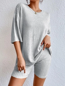 Detail view of grey ribbed knit fabric on casual round neck t-shirt and shorts set
