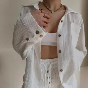 Women's white crinkle fabric long sleeve shirt and drawstring shorts two-piece set