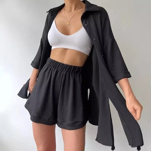 Women's 3-piece casual summer set with black pleated shirt, white tank top and shorts