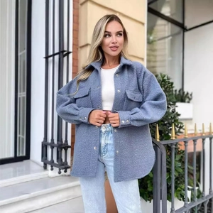 Women's blue textured sherpa shirt jacket with front buttons and chest pockets