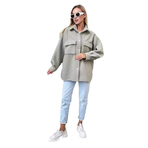 Women's light green wool blend shacket featuring oversized pockets and relaxed fit