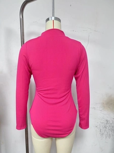 Detail of rose red ribbed knit bodysuit showing the long sleeves and back view design