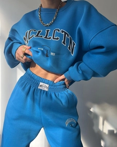 Detail of the high-quality Klein blue fleece tracksuit with MCLLCTN letter printing
