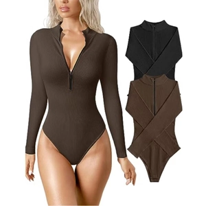 Detail showing ribbed knit fabric and half-zip stand collar on women's long sleeve bodysuits