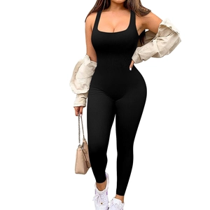 Close-up of the ribbed fabric texture and square neckline of the black sleeveless jumpsuit