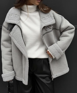 Detail of grey faux suede aviator jacket with thick shearling collar and metal zipper