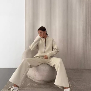 Women's cream waffle knit two-piece set with half-zip sweatshirt and wide-leg trousers