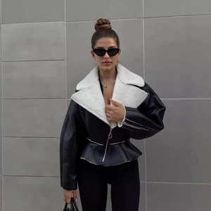 Women's black leather biker jacket with white shearling lapel and peplum waist