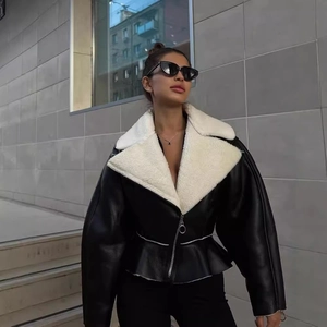 Women's black faux leather shearling jacket with white lapel and peplum waist detail