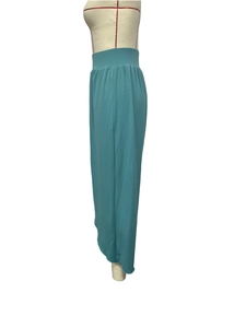 Detailed side view of high-waist peacock blue wide-leg yoga trousers on a mannequin