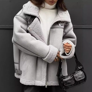 Women's light grey suede and shearling biker jacket with fuzzy trim and metal buckle detail