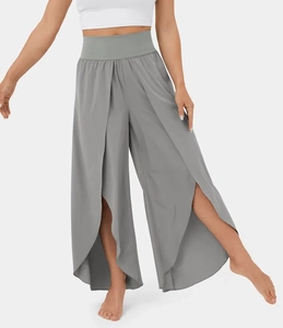 Detail of high-waisted grey flare trousers with front split design for yoga and leisure