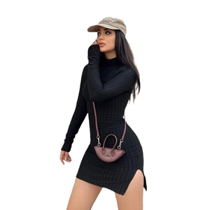 Slim fit black turtleneck knit dress with long sleeves and side slit design for women
