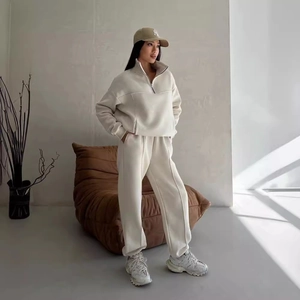 Women's casual cream two-piece tracksuit set with half-zip sweatshirt and trousers