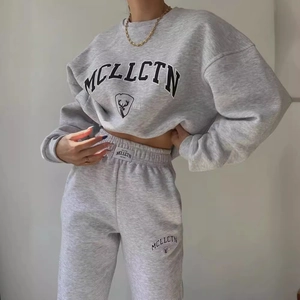 Women's casual grey printed tracksuit set featuring fleece sweatshirt and long joggers