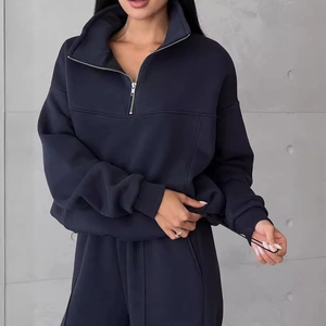 Navy blue two-piece lounge set featuring a half-zip pullover and drawstring pants
