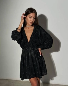 Detail of black deep V-neck sequined mini dress with puffy long sleeves for party