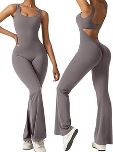 Detailed front and back view of grey-purple flared yoga jumpsuit with open back design