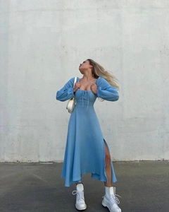 Detail of light blue square neck dress with drawstring and elegant high side slit